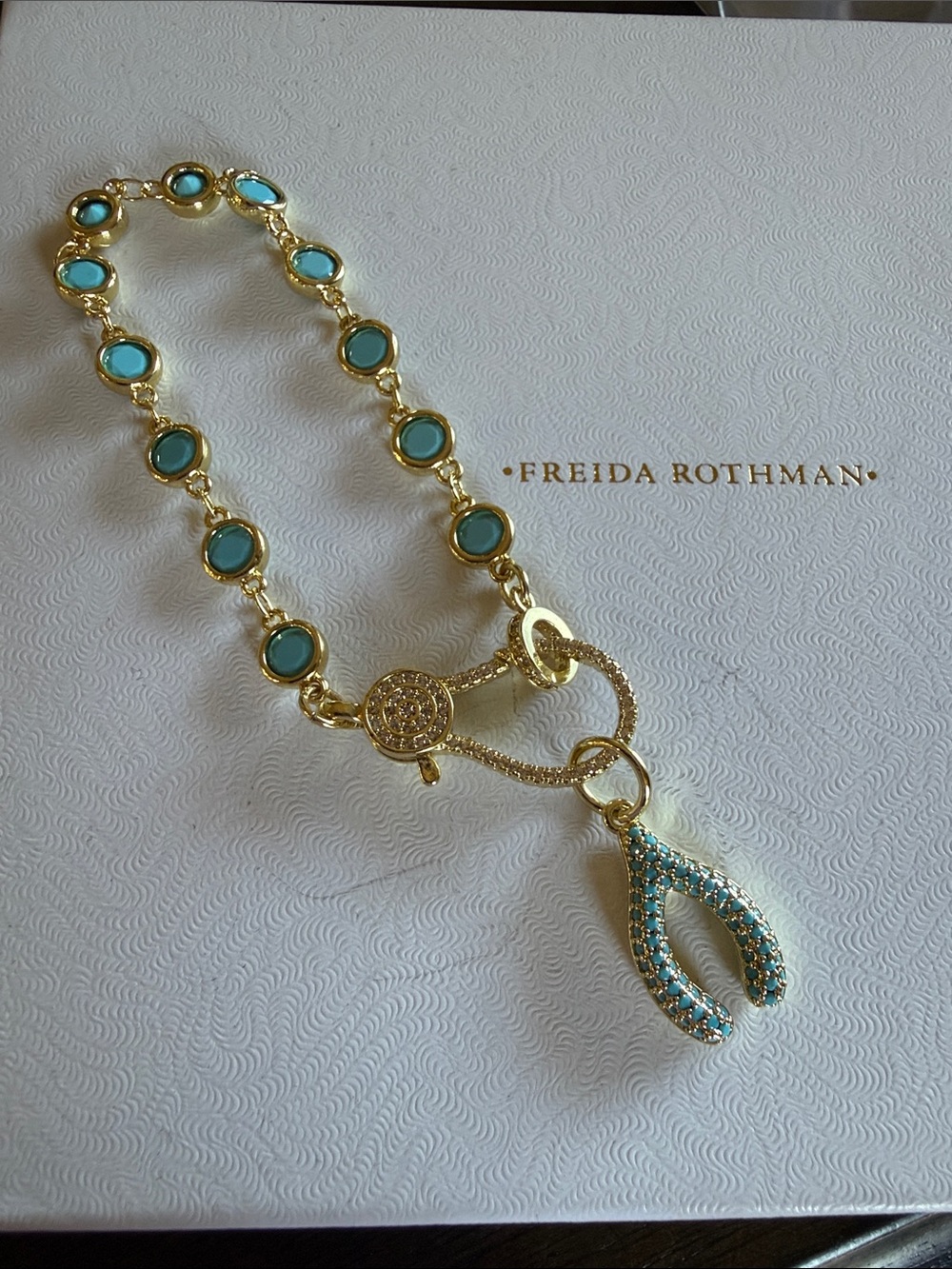 Freida Rothman Bracelet with Turquoise Stones and wishbone charm